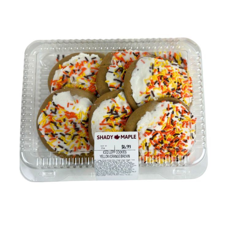 Shady Maple logo showing the words "shady maple" in all capital letters, red with gold trim, over a red maple leaf with gold veining.